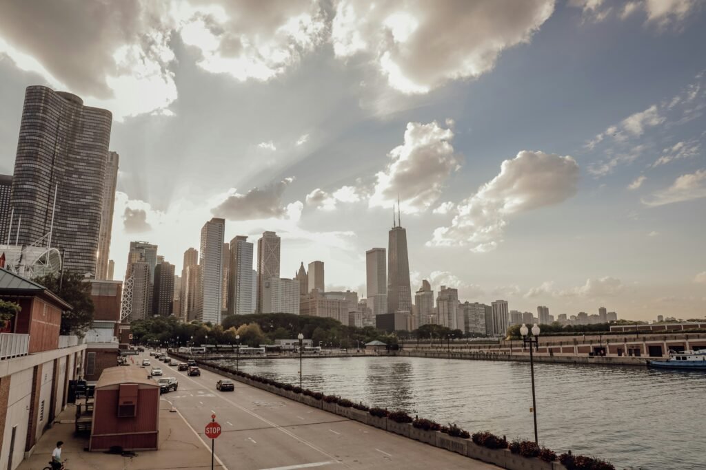Chicago skyline at sunset viewed from Milton Lee Olive Park with the lake in the foreground