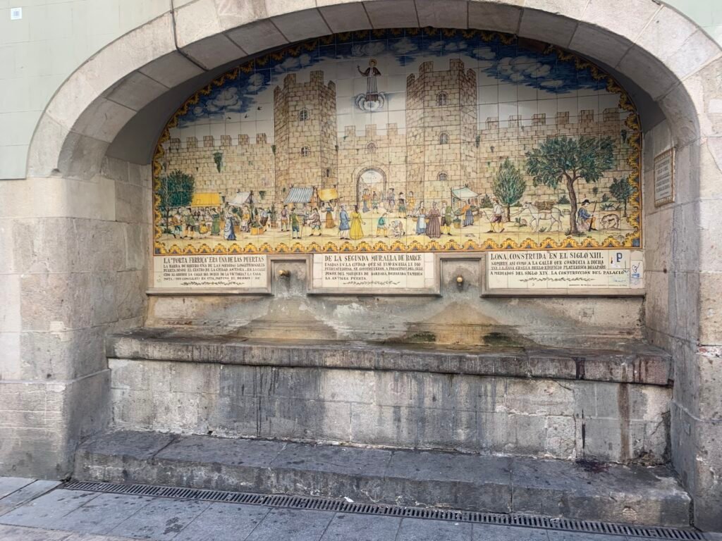 Narrow stone lane in Barcelona Gothic Quarter