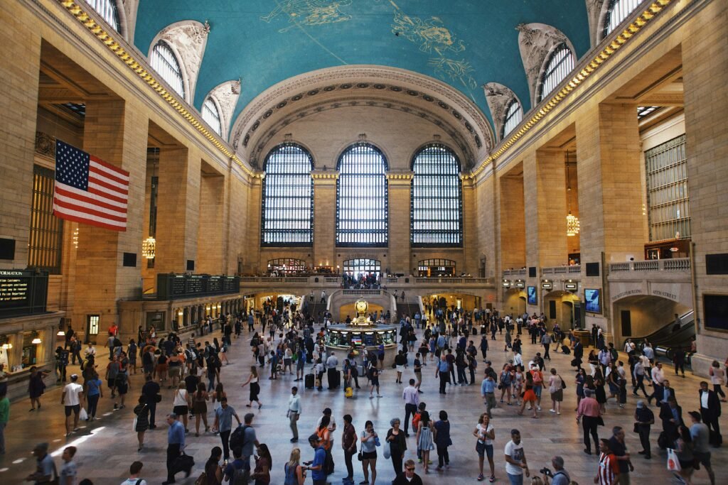 Grand Central Terminal main concourse in New York City with the celestial ceiling above travelers