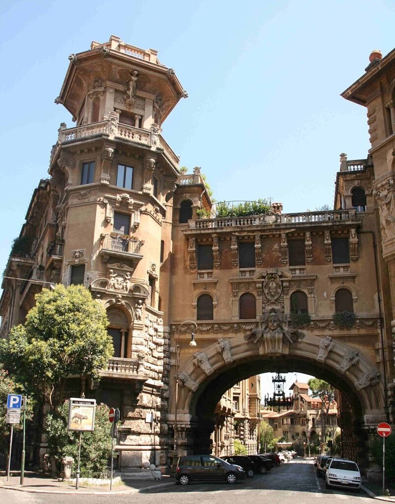Ornate archway and fairytale buildings in Quartiere Coppede in Rome