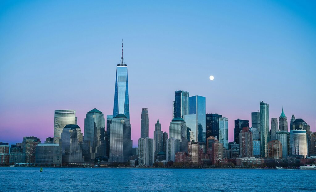 New York City skyline with Manhattan skyscrapers and the Empire State Building at dusk