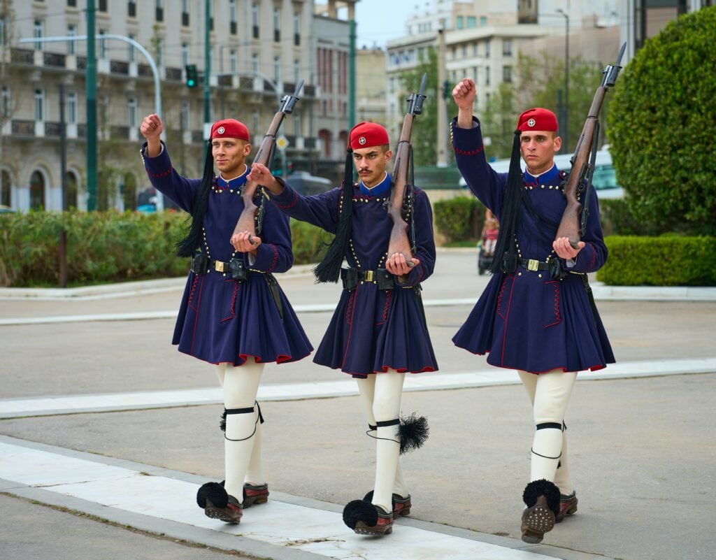 Evzones guards in traditional uniform during the Changing of the Guard at Syntagma Square in Athens