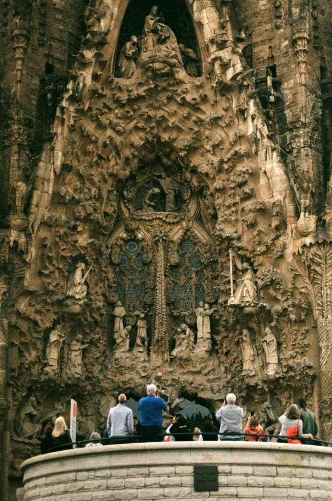 Nativity Facade of the Sagrada Família in Barcelona with detailed stone sculptures and basilica towers