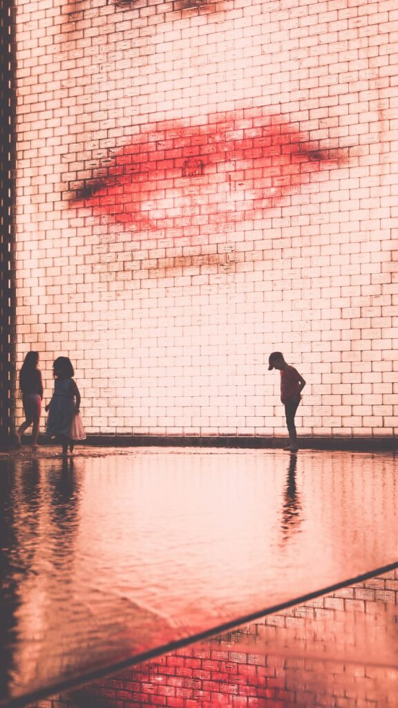 Children playing in the water at Crown Fountain in Millennium Park Chicago