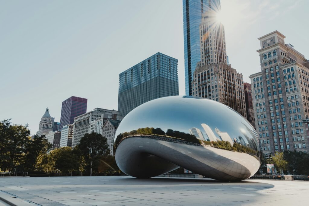 Cloud Gate sculpture in Millennium Park reflecting the Chicago skyline