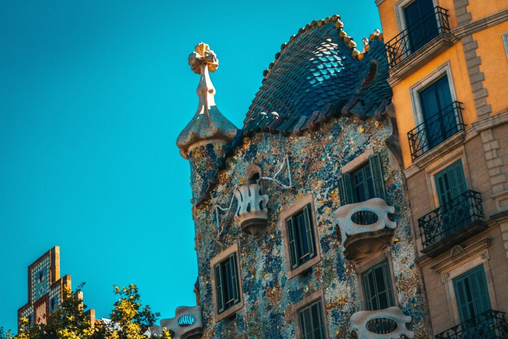 Casa Batllo rooftop with ceramic dragon scales and chimneys in Barcelona